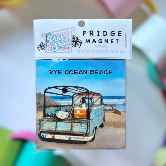 A fridge magnet with a classic Kombi Ute parked overlooking the surf at rye ocean beach in packaging