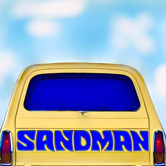 An iconic 1970’s  yellow Holden sandman panelvan from behind print