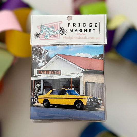 A fridge magnet wth an xy ford parked outside the hamburger in rosebud morinngton peninsula in packaging