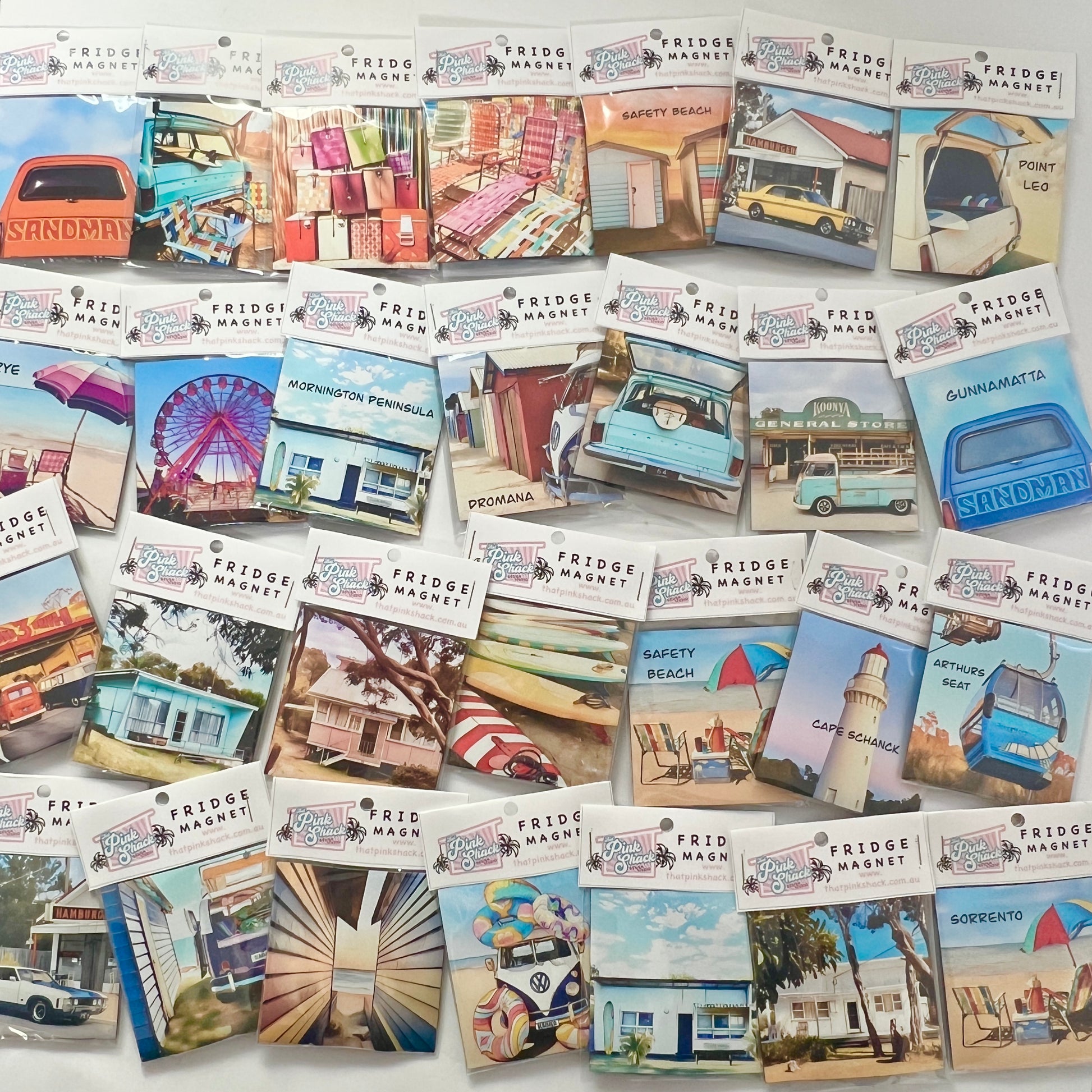 Collection of nostalgic fun beach coastal fridge magnets